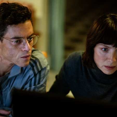 (L-R) Rami Malek as Heller and Caitriona Balfe as Inquiline in 20th Century Studios' THE AMATEUR. Photo by John Wilson. © 2024 20th Century Studios. All Rights Reserved.